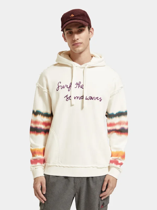 Relaxed-fit raw edge artwork hoodie